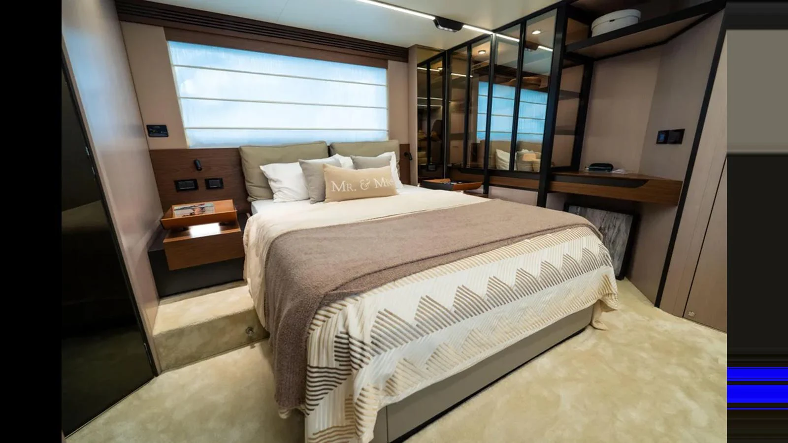 A luxurious stateroom featuring a plush bed with elegant bedding and ample storage space. aboard AZIMUT S7 Yacht for Sale