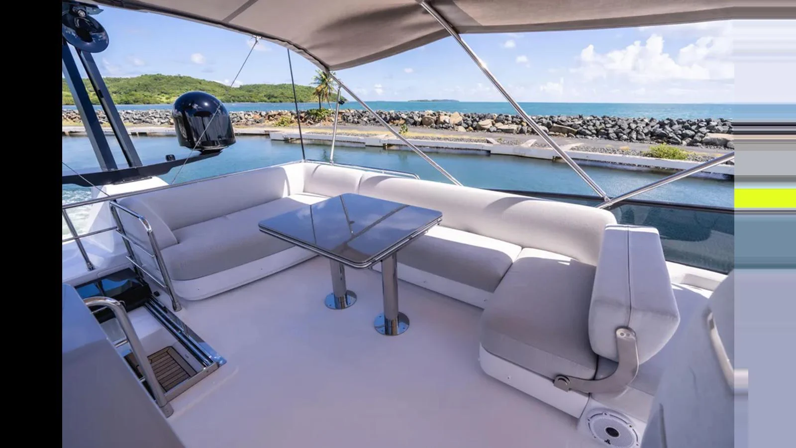 The flybridge offers a spacious seating area with a sleek table, perfect for enjoying panoramic views. aboard AZIMUT S7 Yacht for Sale