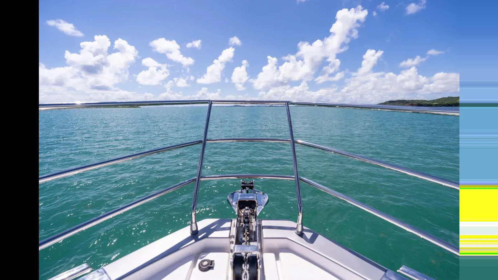 The yacht's bow offers a stunning view of the turquoise waters and clear skies. aboard AZIMUT S7 Yacht for Sale