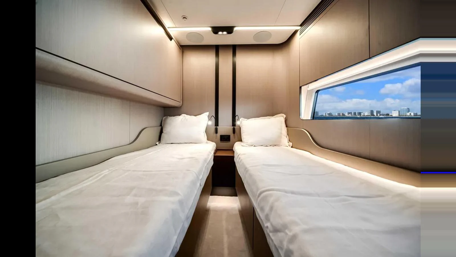 The twin stateroom offers a serene and comfortable space with modern design and ample natural light. aboard 2025 AZIMUT S8 Yacht for Sale