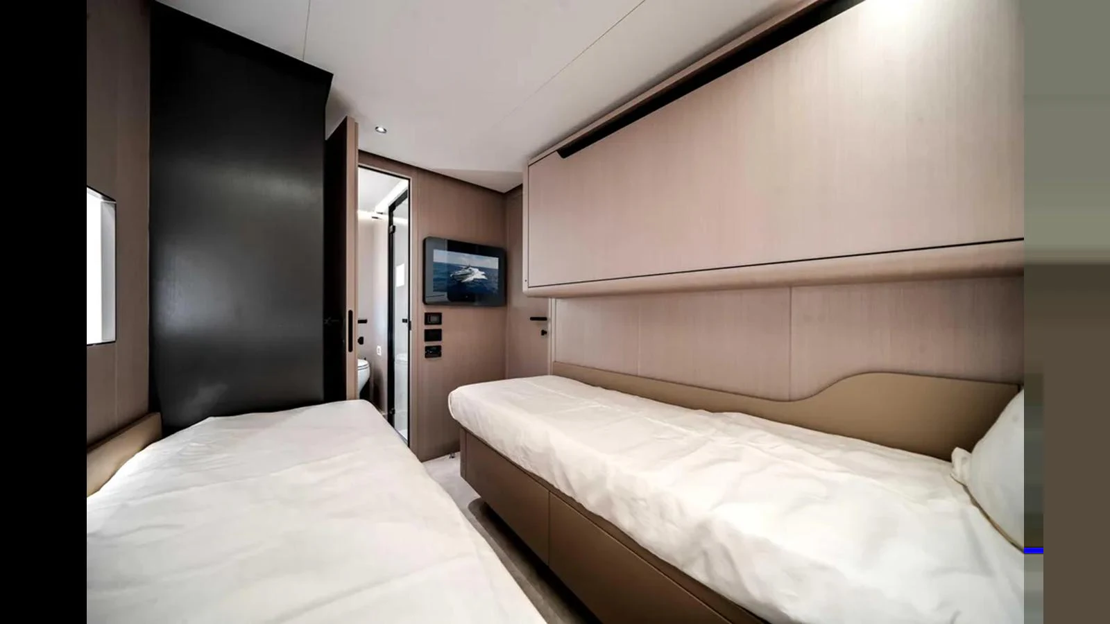 The guest cabin features two single beds and modern decor. aboard 2025 AZIMUT S8 Yacht for Sale