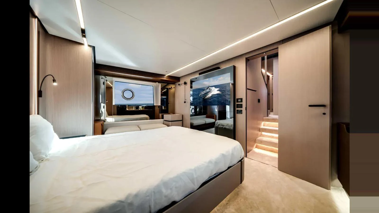 The stateroom features a luxurious bed, modern lighting, and elegant wood finishes. aboard 2025 AZIMUT S8 Yacht for Sale