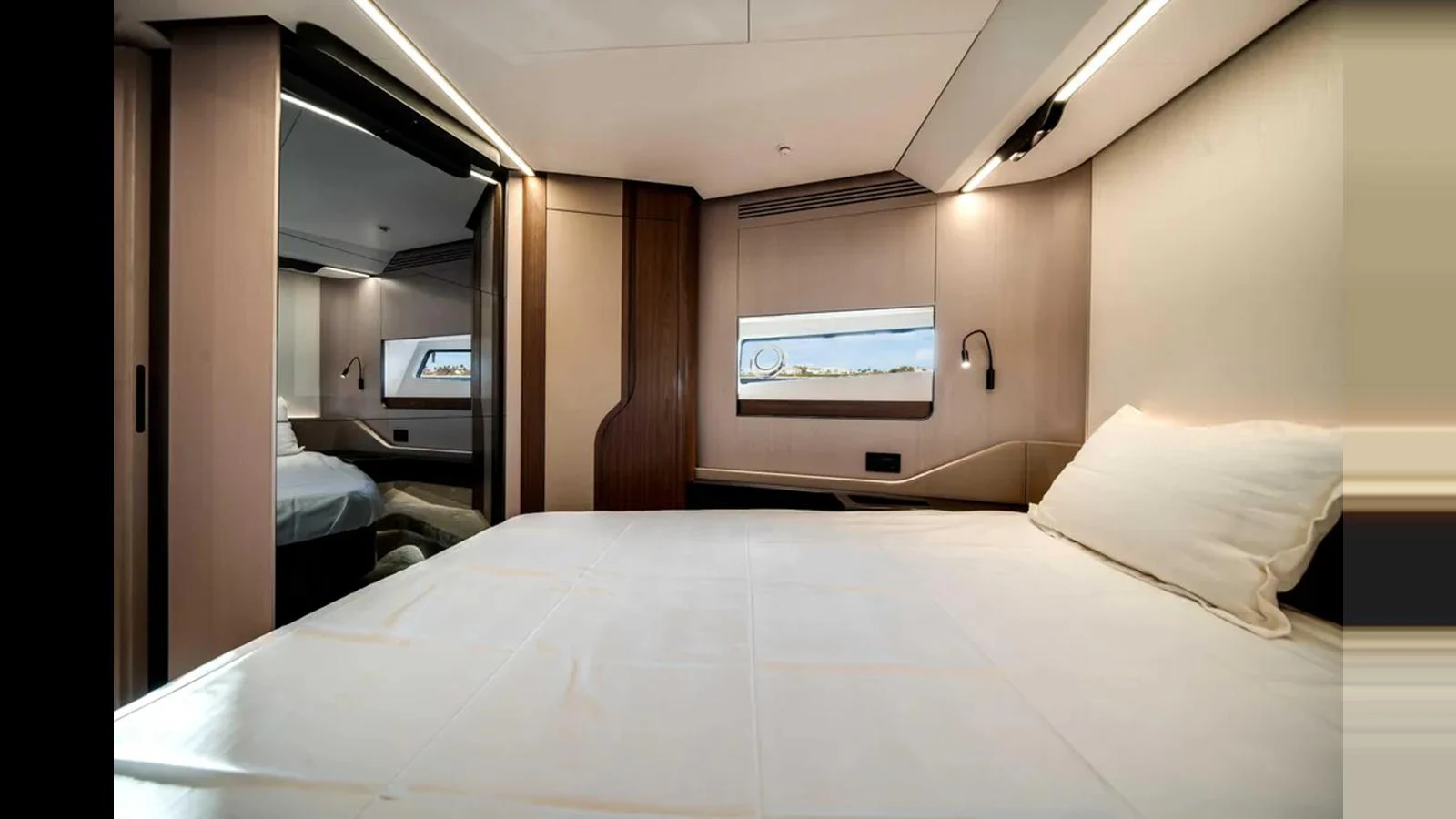 The stateroom features a spacious bed with modern lighting and sleek wood finishes. aboard 2025 AZIMUT S8 Yacht for Sale