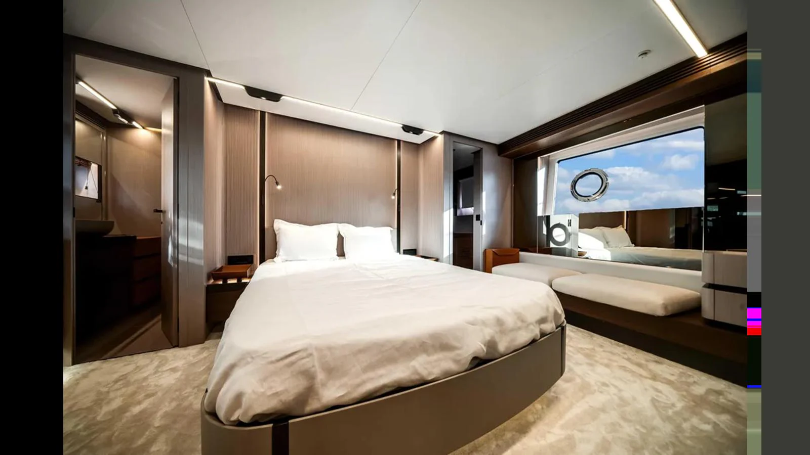 The master stateroom features a luxurious bed, ample natural light, and modern decor. aboard 2025 AZIMUT S8 Yacht for Sale
