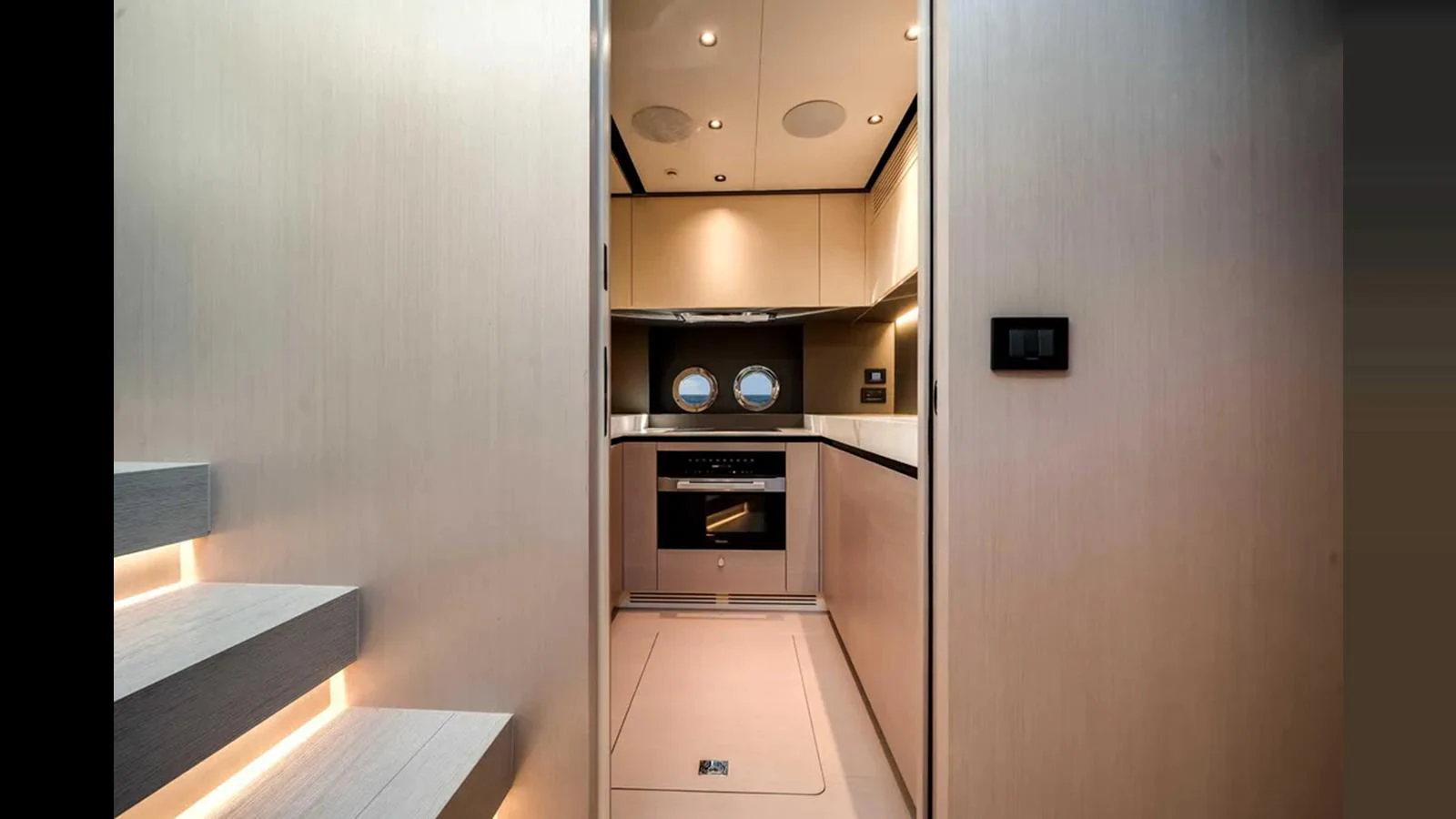 The yacht's galley is sleek and modern, featuring high-end appliances and stylish lighting. aboard 2025 AZIMUT S8 Yacht for Sale
