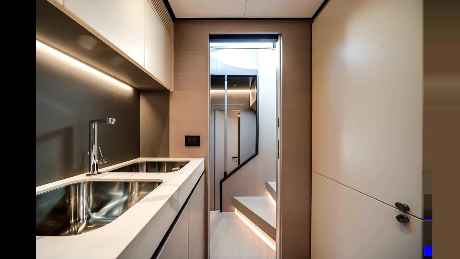 The sleek and modern galley features high-end fixtures and a minimalist design. aboard 2025 AZIMUT S8 Yacht for Sale