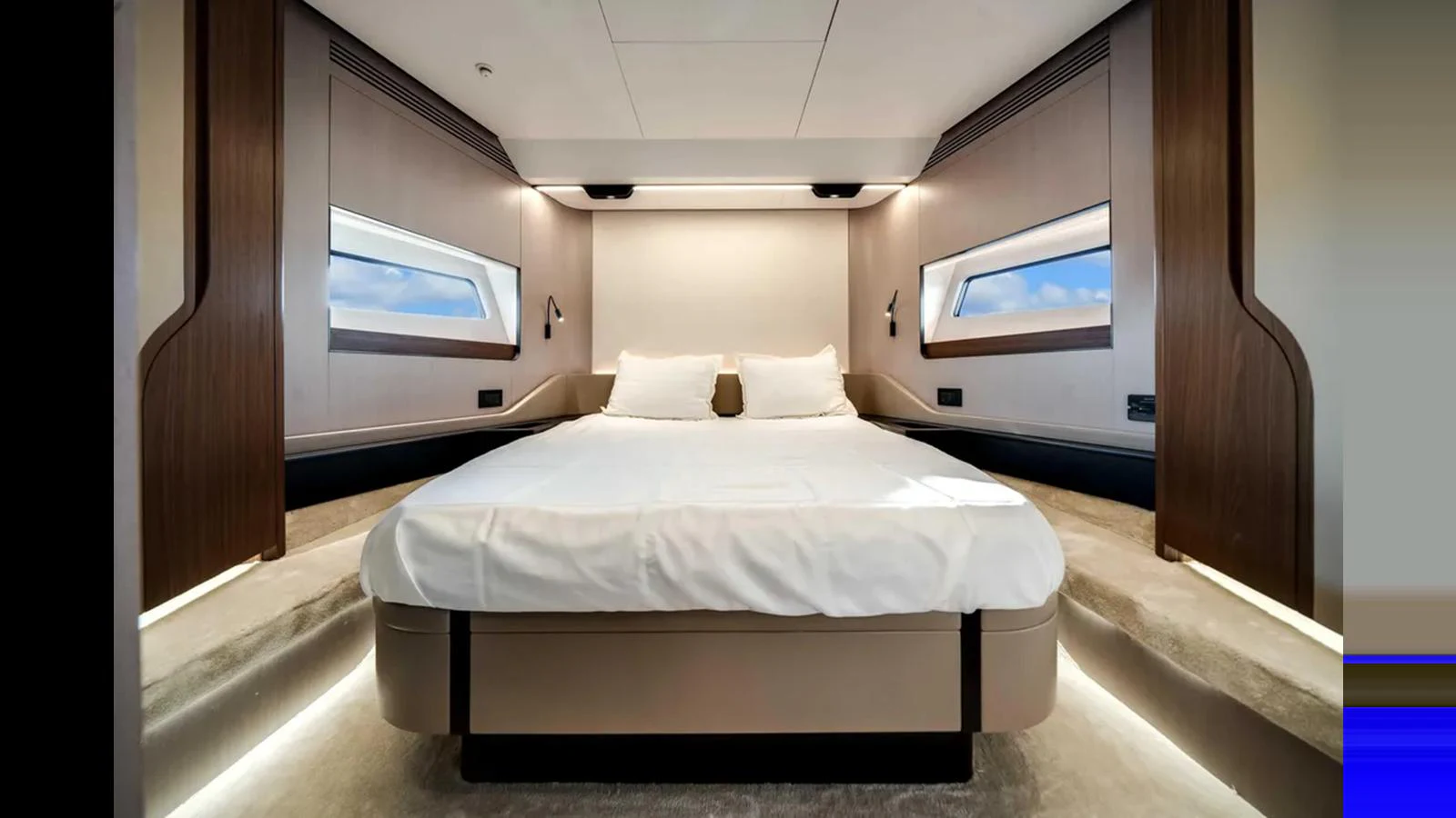 The stateroom features a luxurious bed with modern design elements and ample natural light. aboard 2025 AZIMUT S8 Yacht for Sale