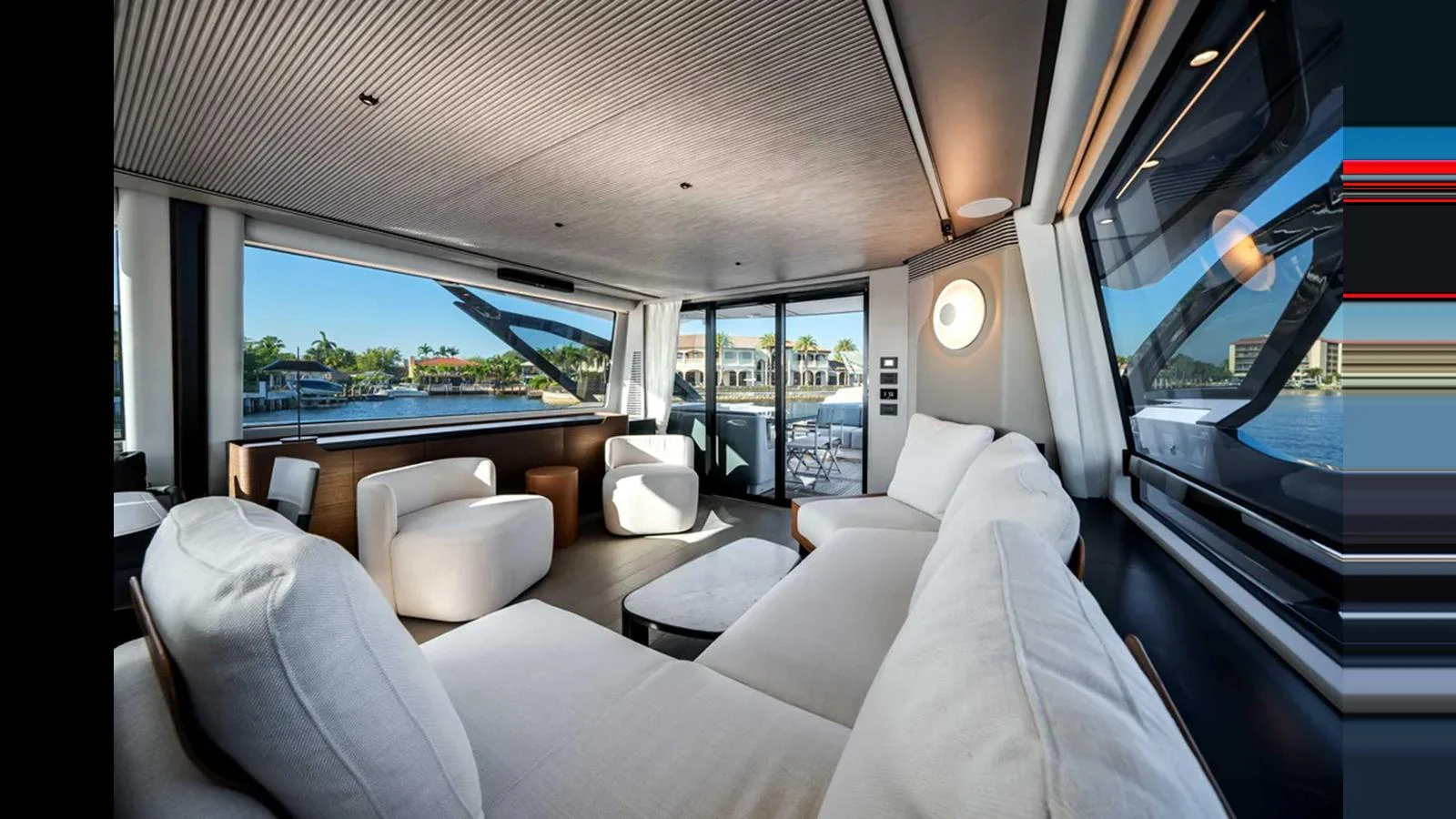 The salon offers a spacious and luxurious seating area with panoramic views. aboard 2025 AZIMUT S8 Yacht for Sale