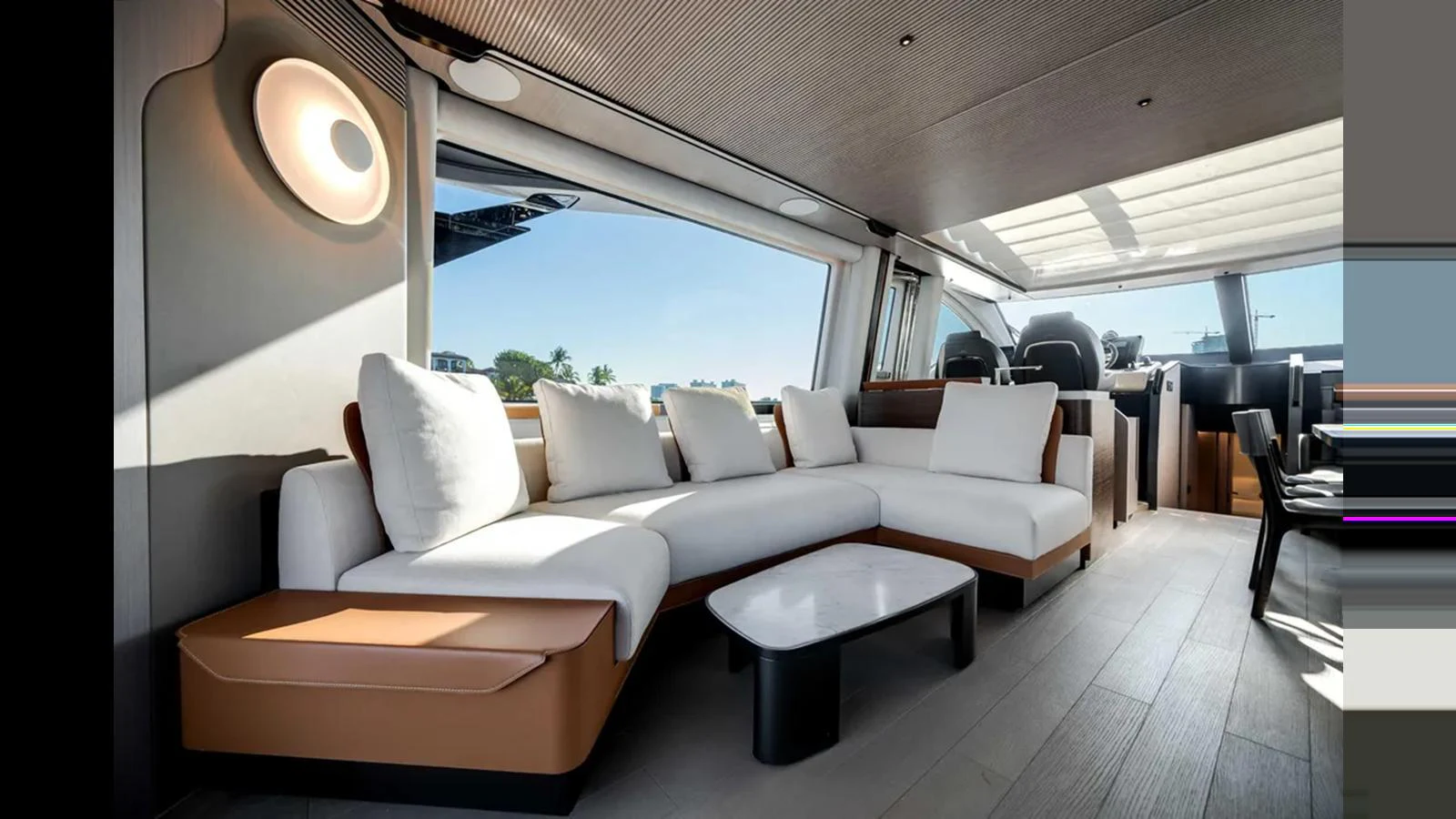 The salon features a modern and spacious seating area with ample natural light. aboard 2025 AZIMUT S8 Yacht for Sale