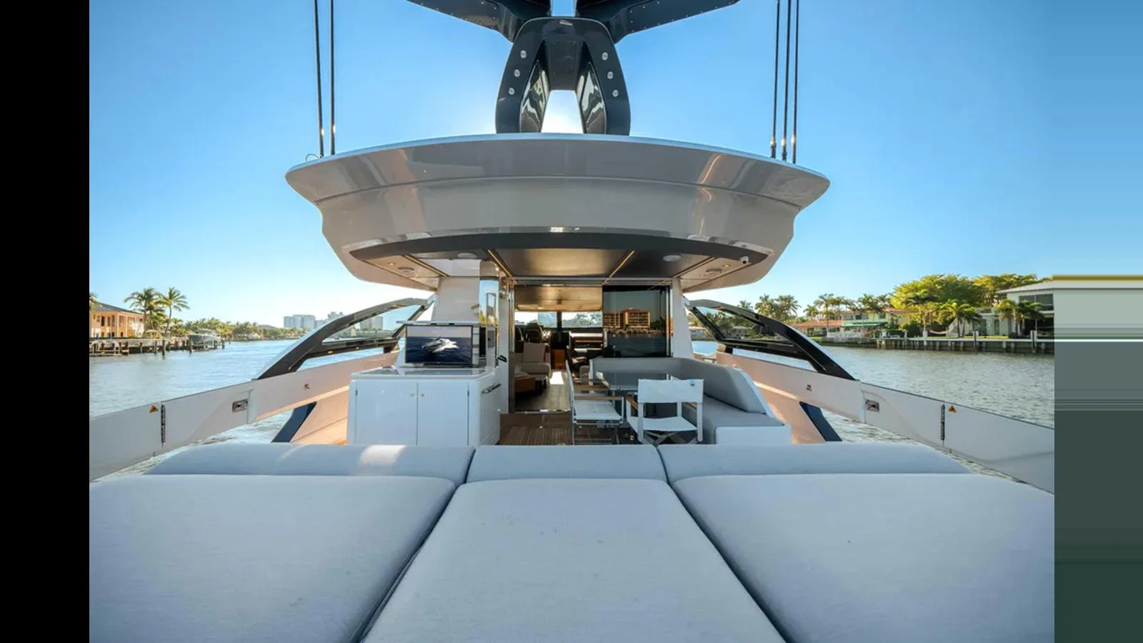 The aft deck offers a spacious and inviting area for relaxation and socializing with stunning water views. aboard 2025 AZIMUT S8 Yacht for Sale