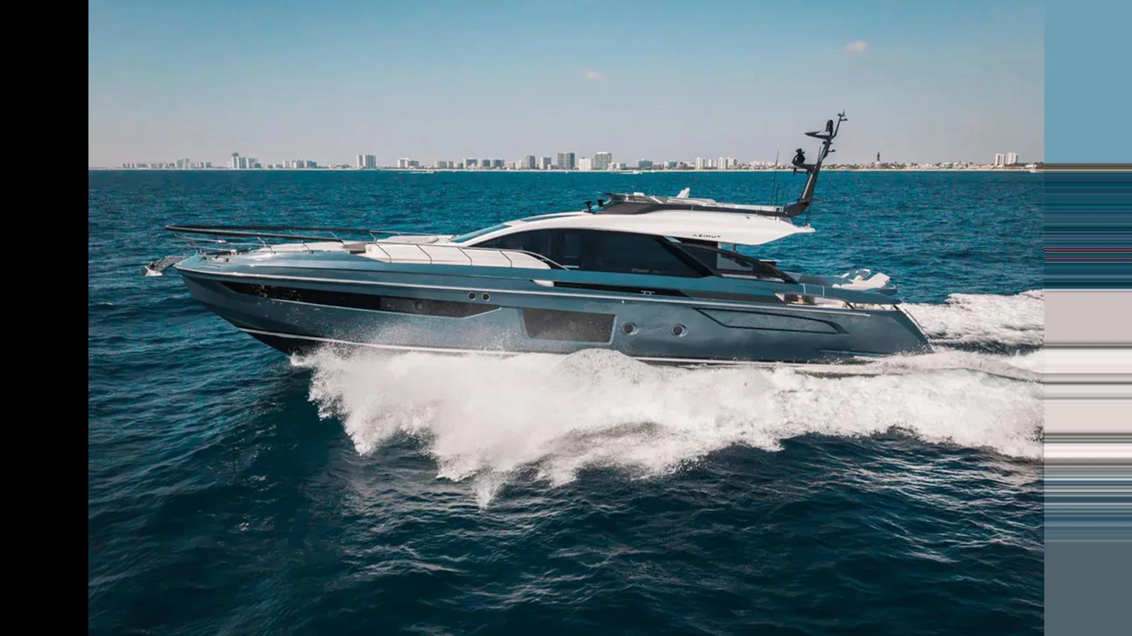 A sleek and modern yacht cruising on the open sea with a city skyline in the background. aboard 2025 AZIMUT S8 Yacht for Sale