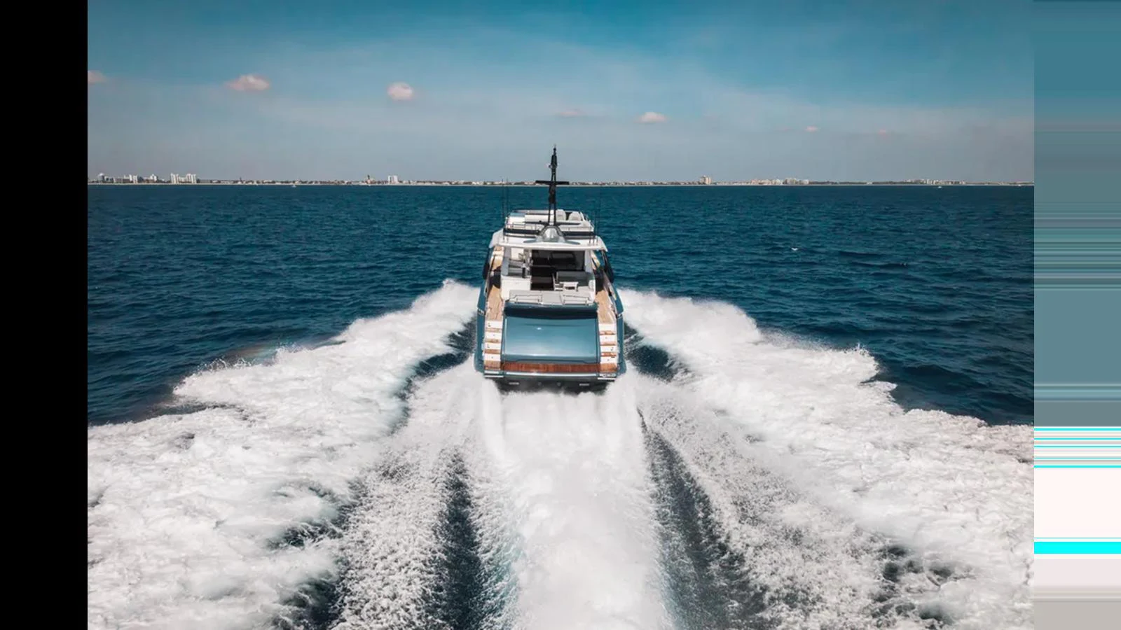 A yacht speeds away on the open sea, leaving a trail of white wake behind. aboard 2025 AZIMUT S8 Yacht for Sale