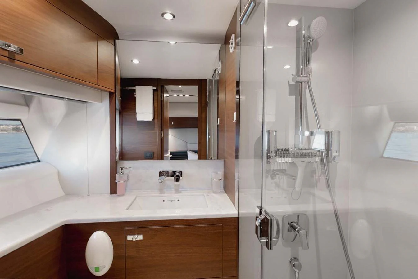 The yacht's bathroom features modern fixtures and a sleek design with ample natural light. aboard CAMILLE Yacht for Sale