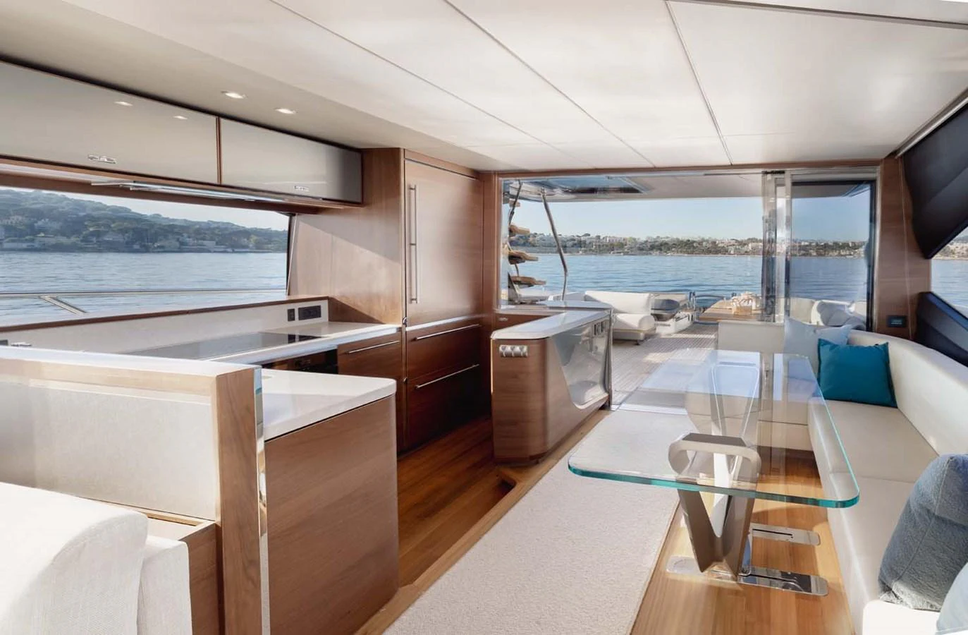 The salon offers a spacious and elegant area with panoramic views and modern furnishings. aboard CAMILLE Yacht for Sale