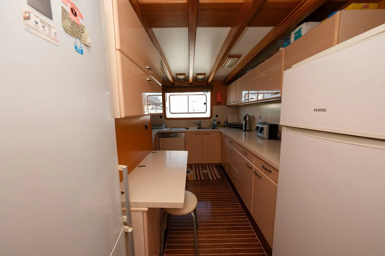 The galley features modern appliances and ample counter space for meal preparation. aboard XANAX Yacht for Sale