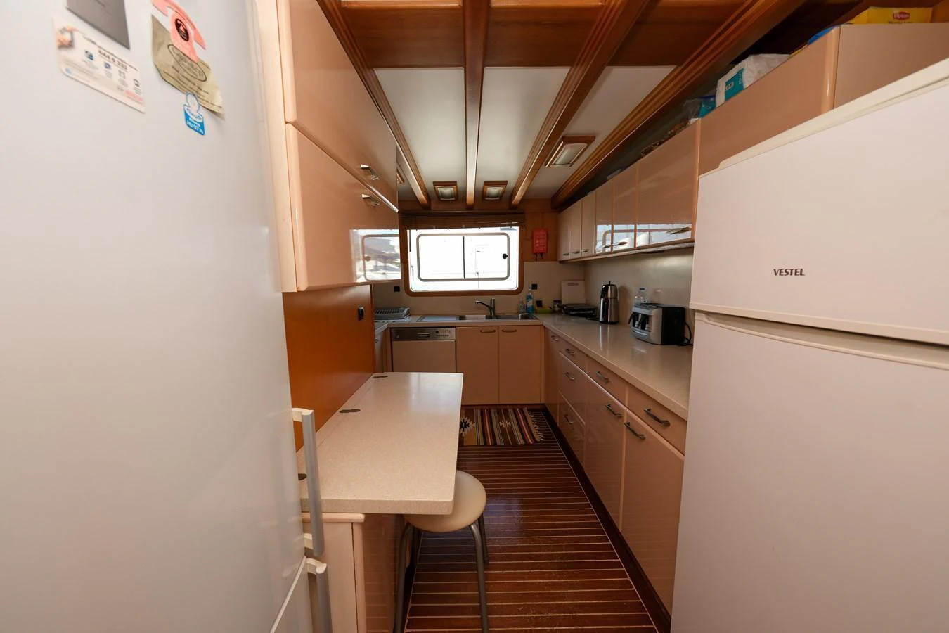 The galley features modern appliances and ample counter space for meal preparation. aboard XANAX Yacht for Sale