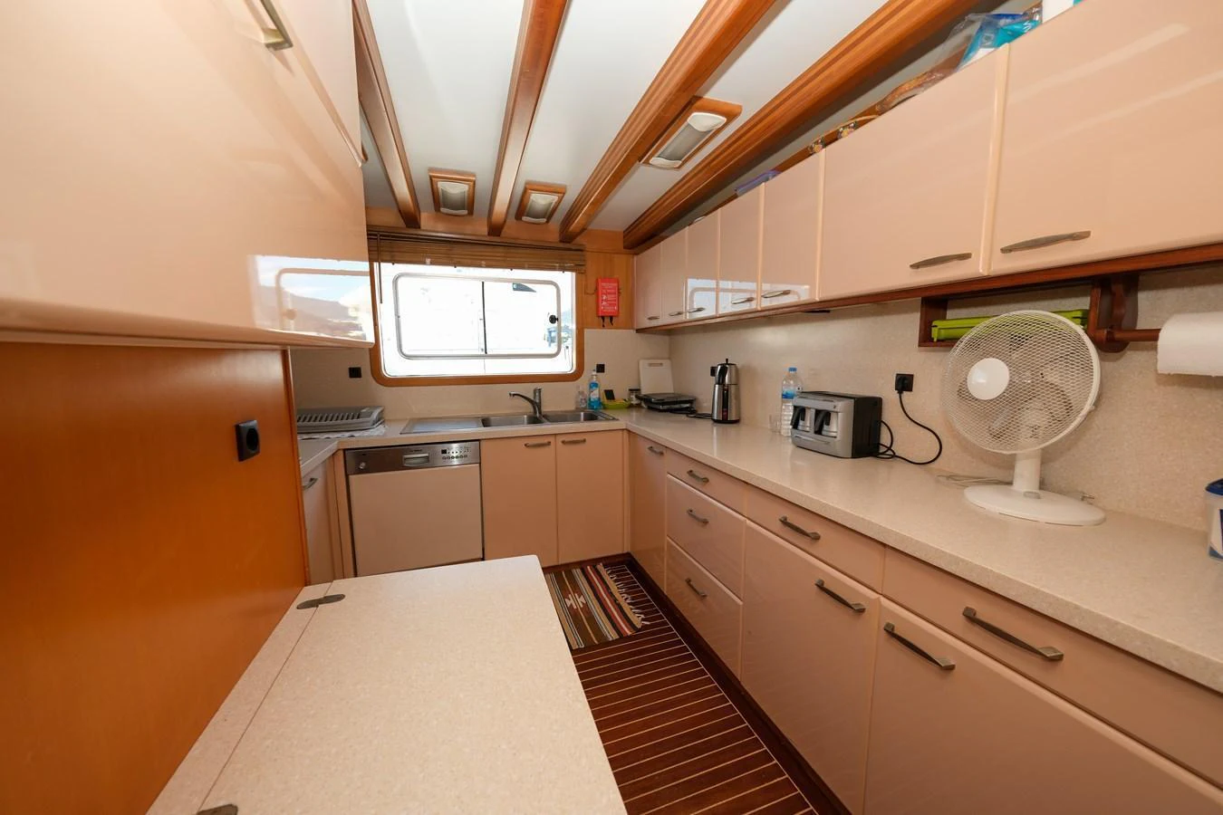 The galley features modern appliances and ample counter space, perfect for meal preparation. aboard XANAX Yacht for Sale