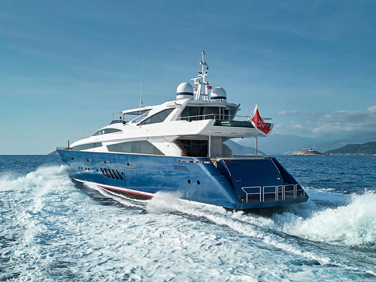 A sleek and modern yacht cruises through the open sea, showcasing its elegant design and powerful performance. aboard COF Yacht for Sale