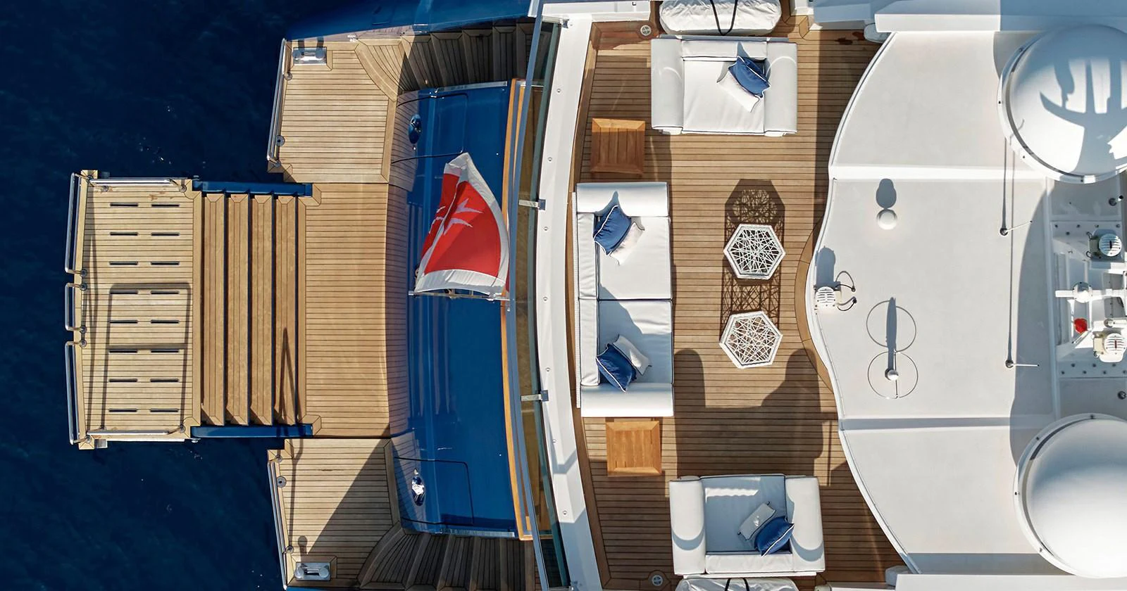 The aft deck offers a luxurious space for relaxation with comfortable seating and elegant decor. aboard COF Yacht for Sale