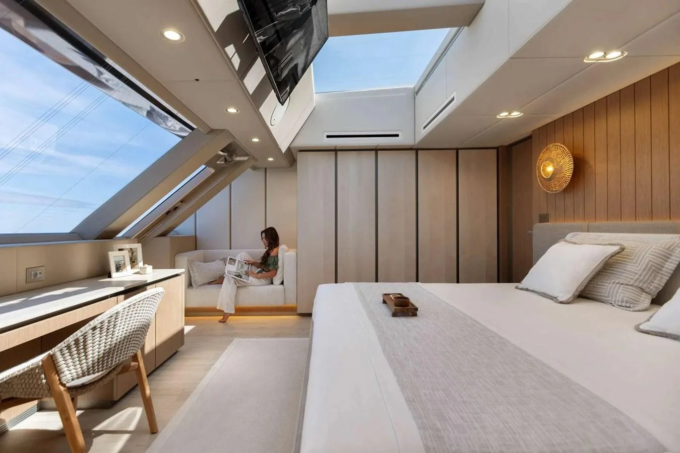 The master stateroom features a spacious and modern design with large windows and a comfortable seating area. aboard TWILIGHT Yacht for Sale