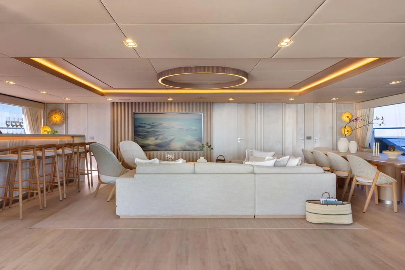 The salon features a spacious and elegantly designed seating area with modern decor and ample natural light. aboard TWILIGHT Yacht for Sale