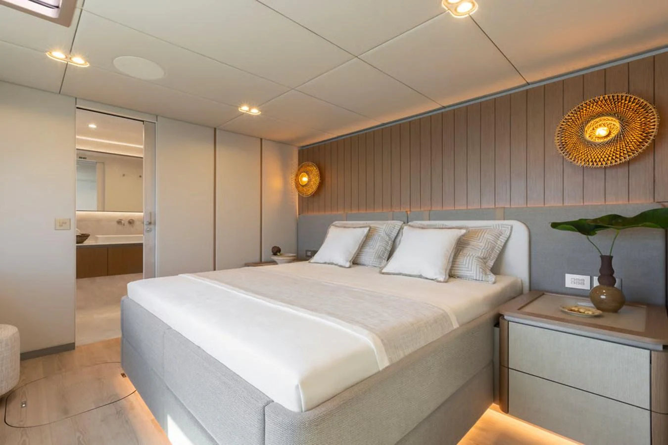 The master stateroom features a luxurious bed with elegant decor and ample natural light. aboard TWILIGHT Yacht for Sale