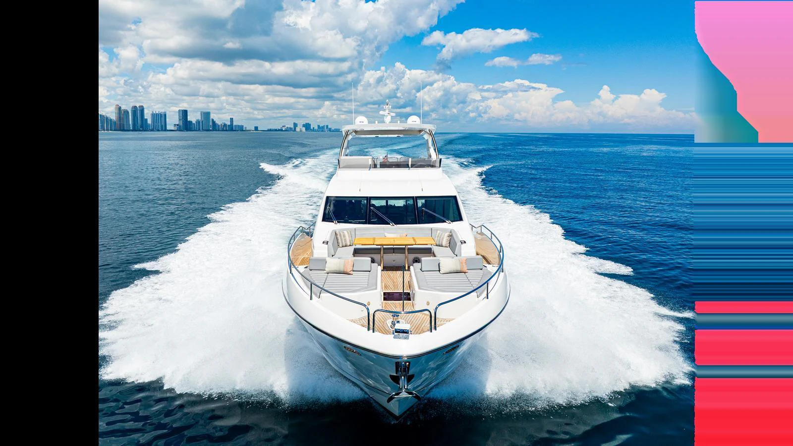 A sleek yacht cruises powerfully through the open water, showcasing its modern design and spacious deck. aboard STEELN Yacht for Sale