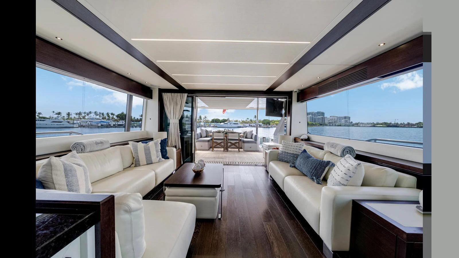The salon offers a spacious and elegant area with plush seating and panoramic views. aboard STEELN Yacht for Sale