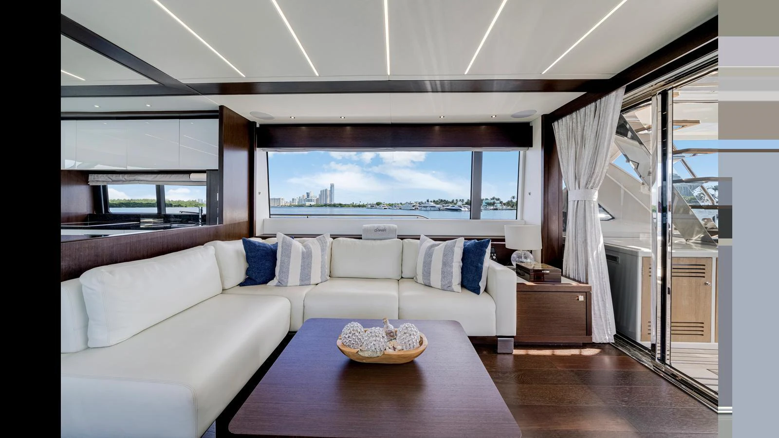 The salon features a spacious and elegant seating area with panoramic views. aboard STEELN Yacht for Sale