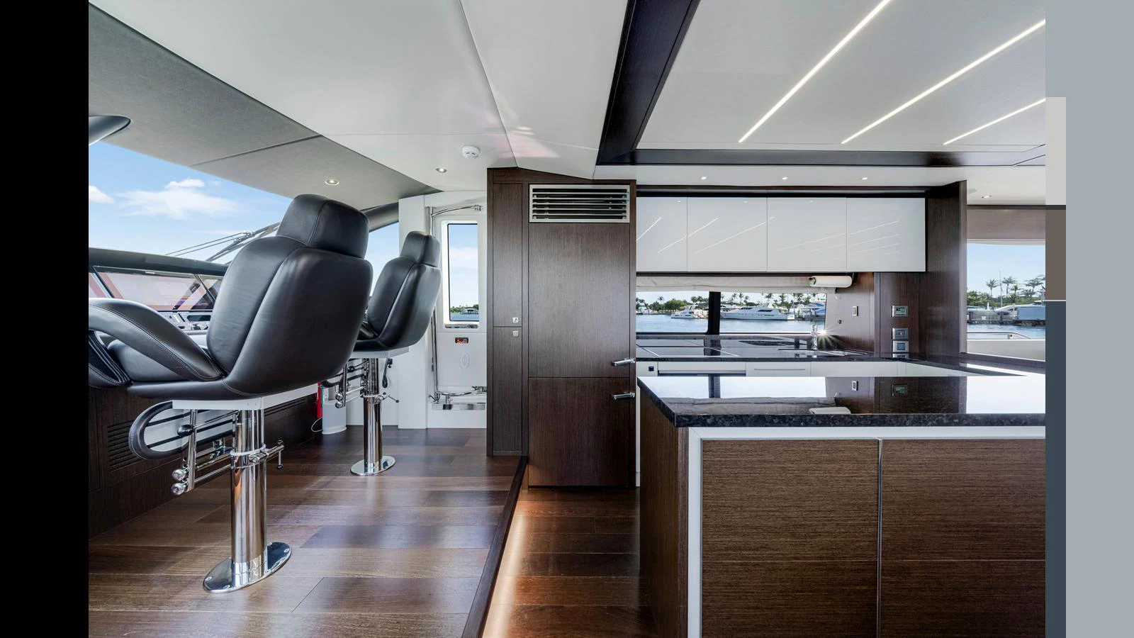 The yacht's helm area features sleek, modern design with high-end materials and finishes. aboard STEELN Yacht for Sale