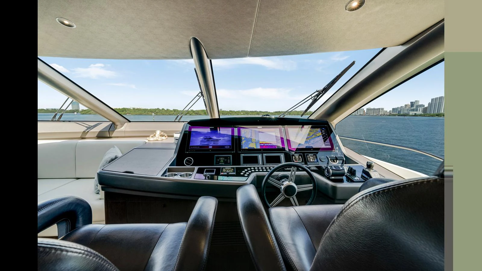 The helm of this yacht features advanced navigation equipment and a panoramic view of the water. aboard STEELN Yacht for Sale