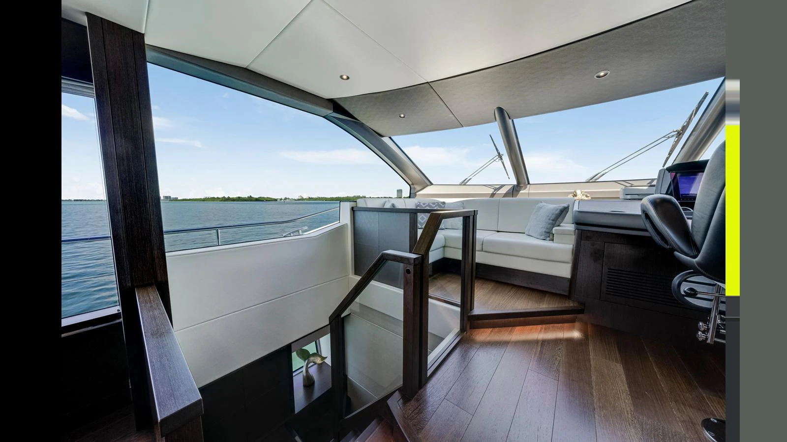 The helm area offers a panoramic view with sleek, modern finishes and comfortable seating. aboard STEELN Yacht for Sale