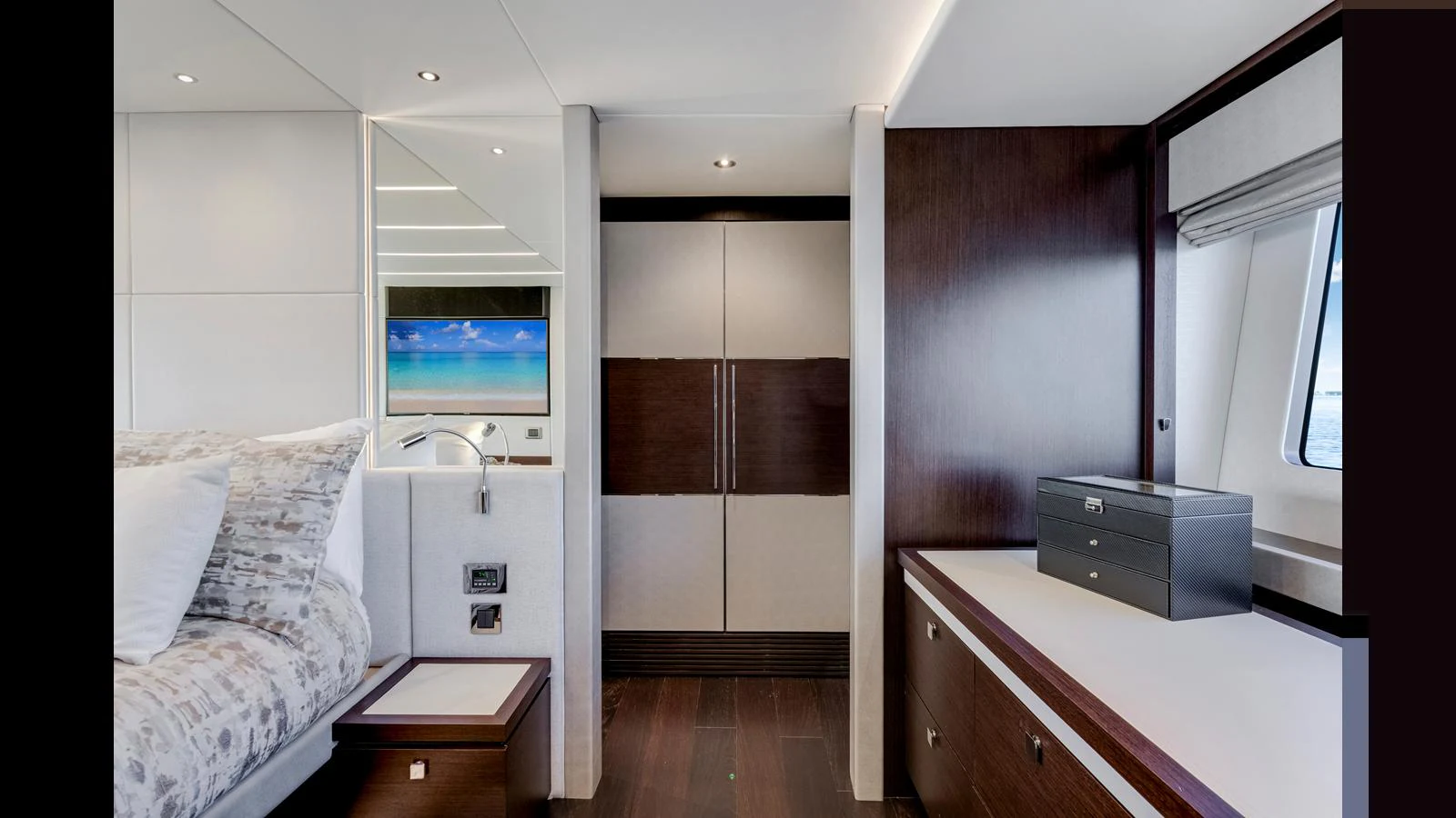 A luxurious stateroom featuring elegant wood finishes and a serene ambiance. aboard STEELN Yacht for Sale
