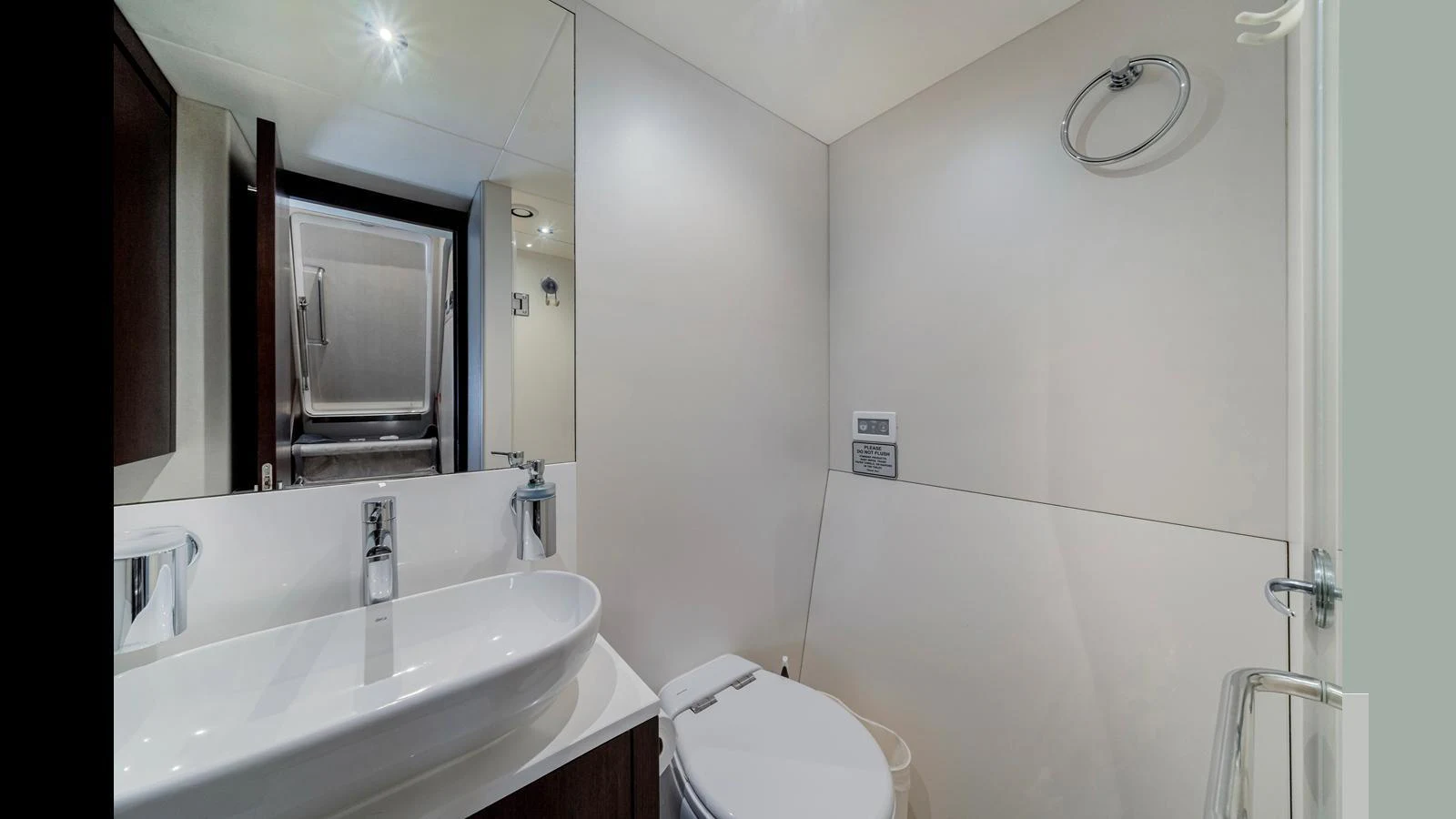 The yacht's bathroom features modern fixtures and a sleek design. aboard STEELN Yacht for Sale