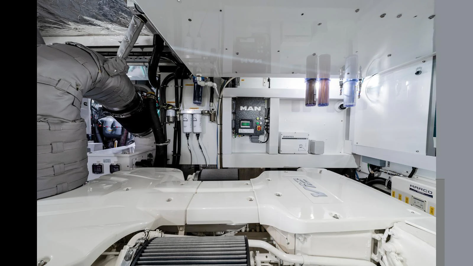 The image showcases the yacht's well-maintained engine room with advanced machinery and equipment. aboard STEELN Yacht for Sale