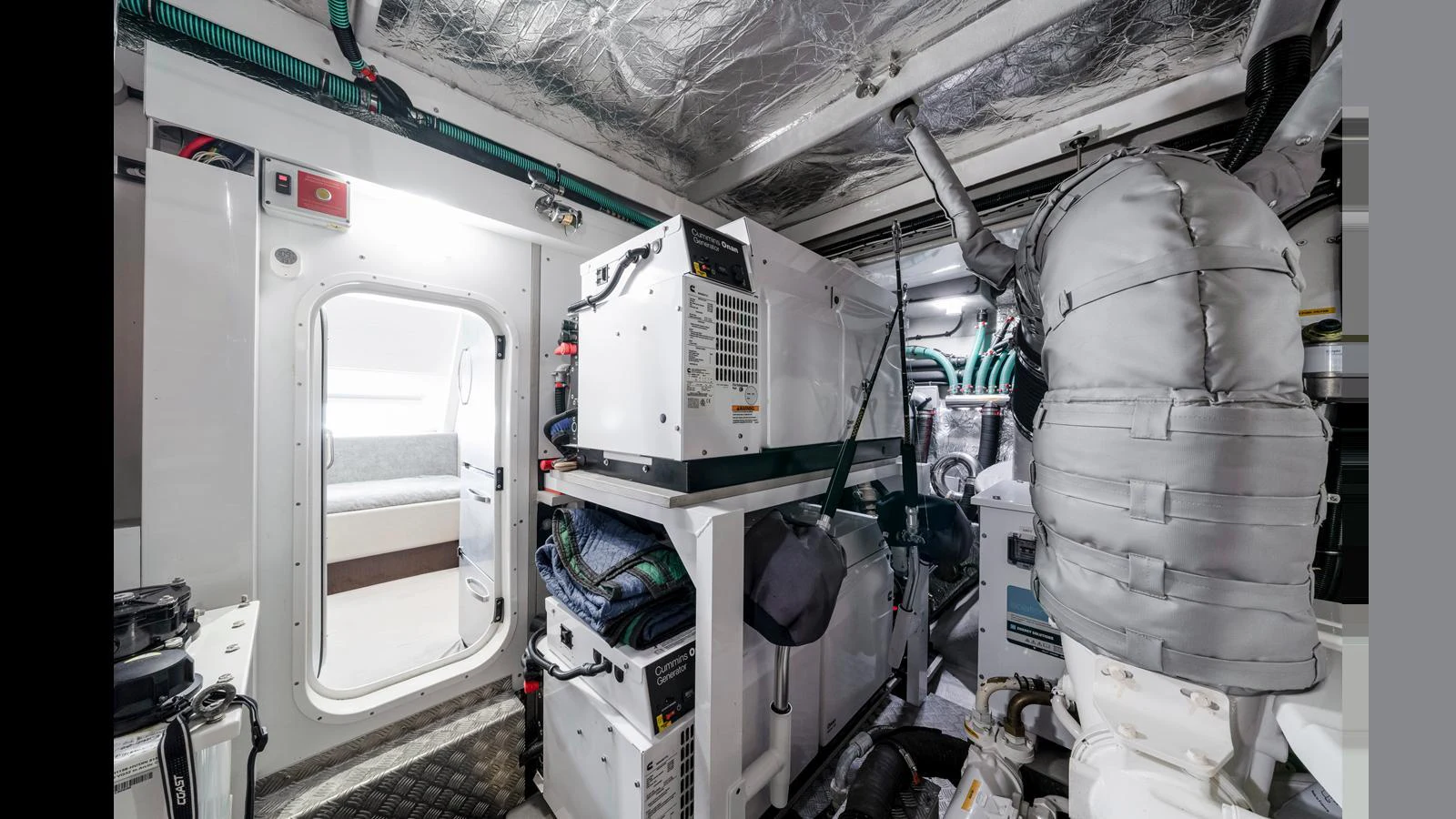 The engine room is meticulously organized, showcasing advanced machinery and equipment. aboard STEELN Yacht for Sale