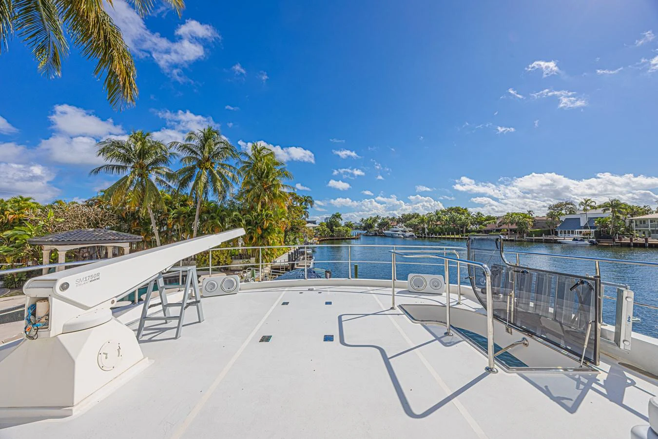 The sundeck offers a spacious area with stunning views of the surrounding water and lush greenery. aboard MARGARITA Yacht for Sale