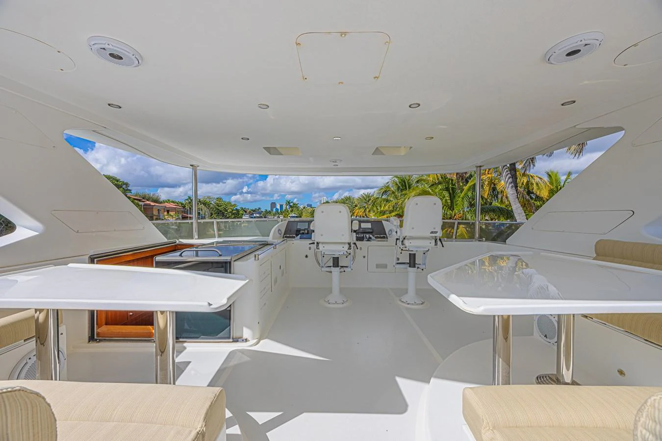 The flybridge offers a spacious and open area with comfortable seating and a helm station, perfect for enjoying panoramic views. aboard MARGARITA Yacht for Sale
