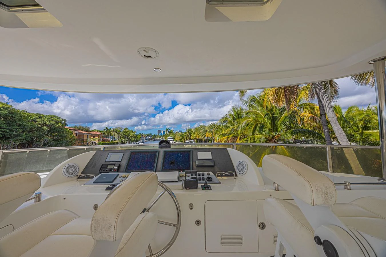 The helm station offers a commanding view with state-of-the-art navigation equipment and plush seating. aboard MARGARITA Yacht for Sale