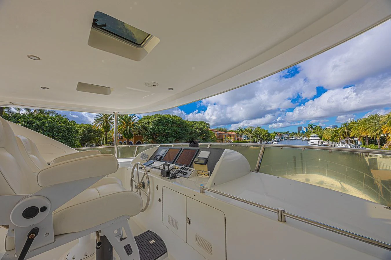 The helm station offers a commanding view with advanced navigation equipment and luxurious seating. aboard MARGARITA Yacht for Sale
