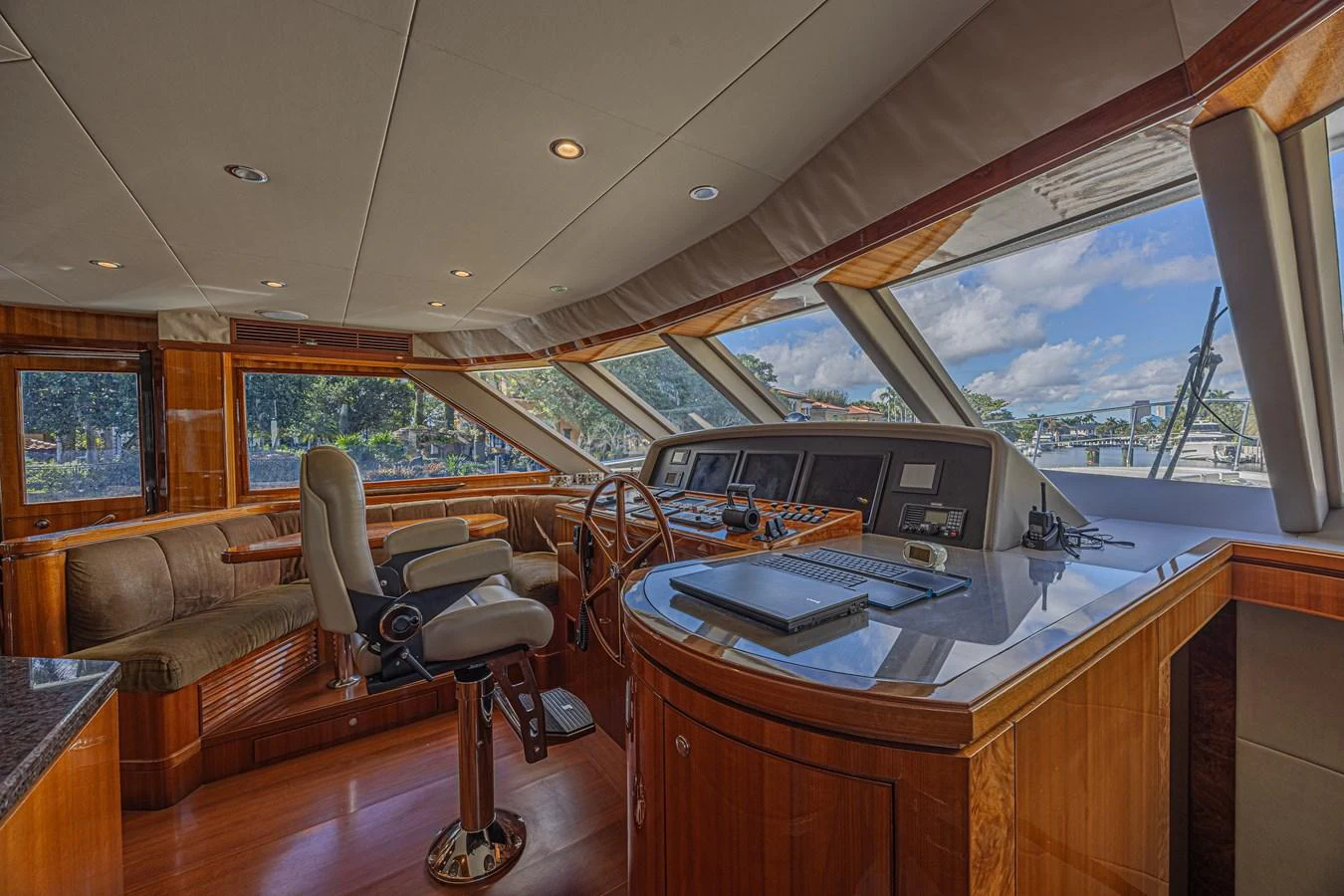 The helm station features a sophisticated control area with panoramic windows offering stunning views. aboard MARGARITA Yacht for Sale