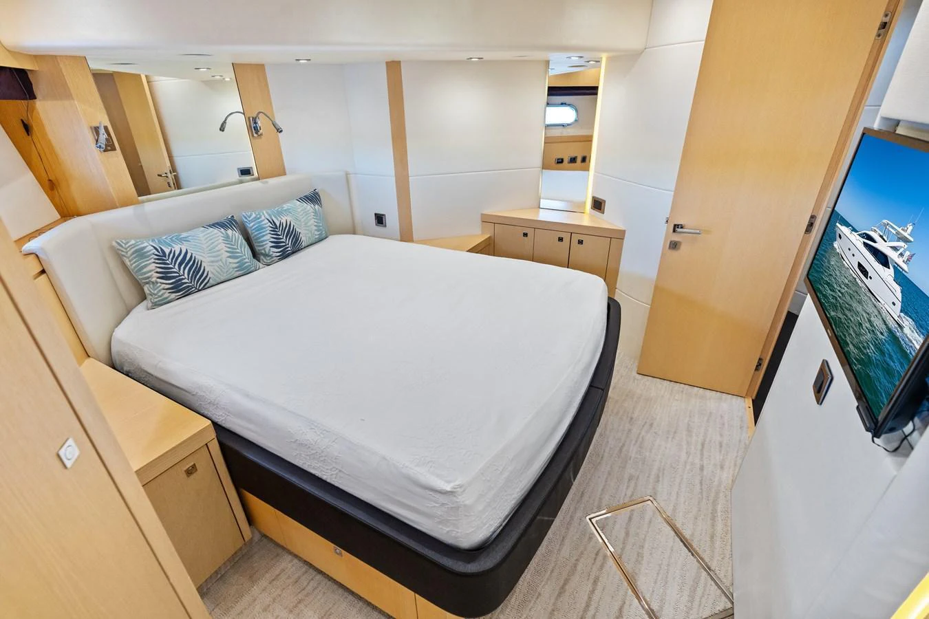 The stateroom features a comfortable bed with stylish decor and ample storage space. aboard IT'S ENOUGH Yacht for Sale