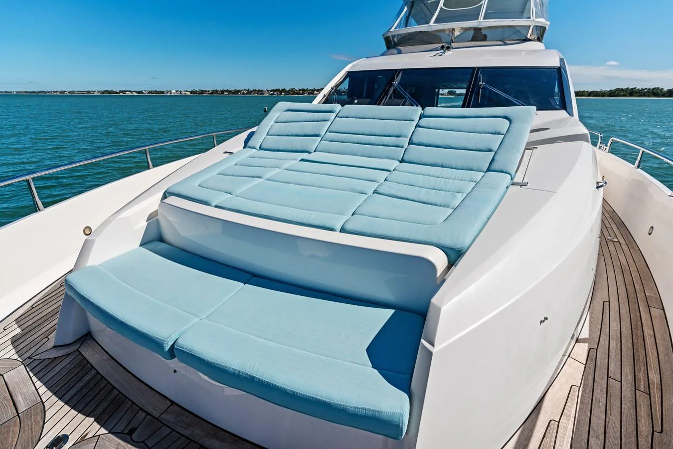 The foredeck features spacious sun pads with a stunning view of the water. aboard IT'S ENOUGH Yacht for Sale
