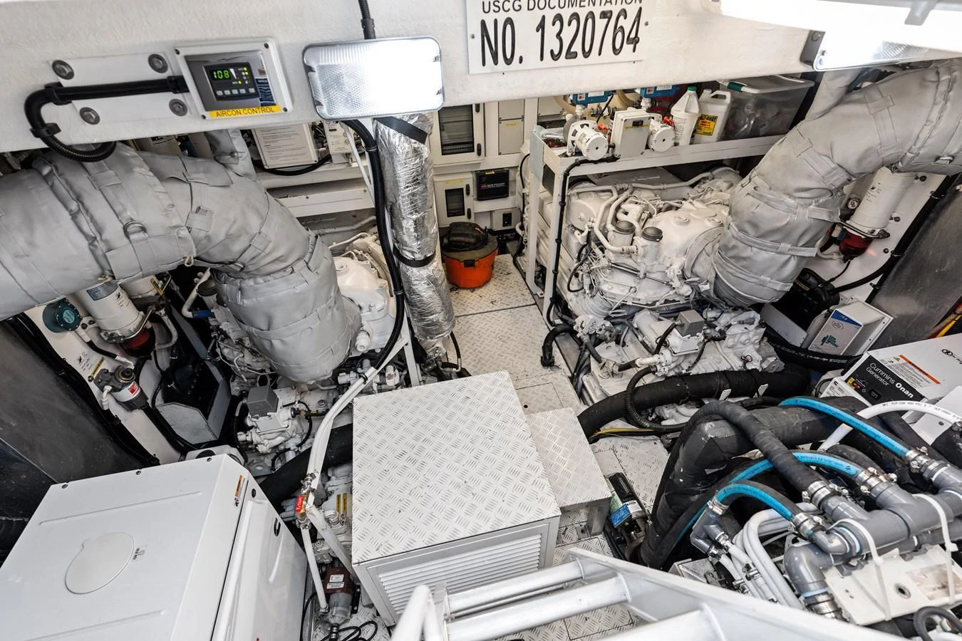 The image showcases the well-maintained engine room of the yacht, highlighting its technical components and machinery. aboard IT'S ENOUGH Yacht for Sale