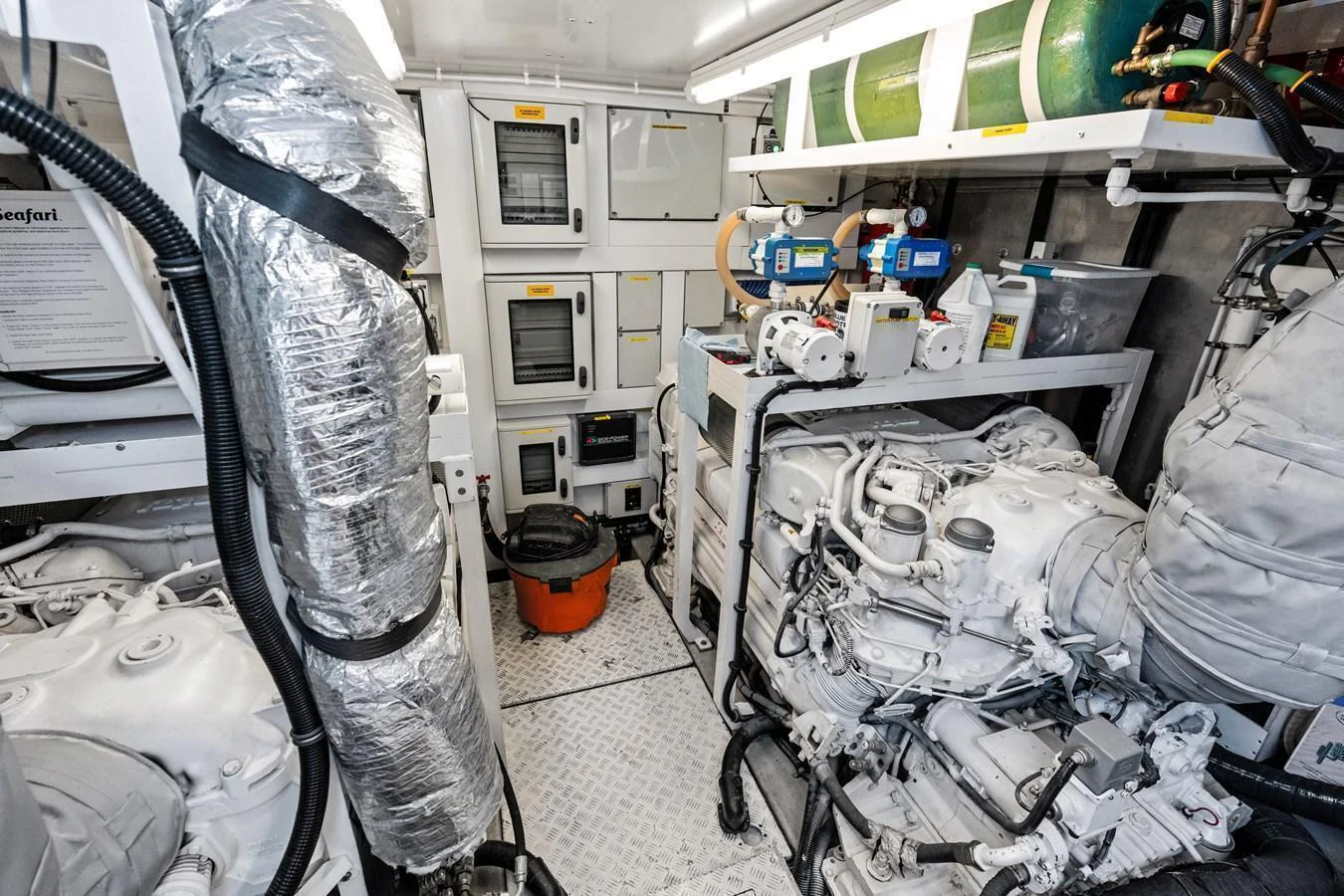 The engine room showcases the yacht's powerful and well-maintained machinery. aboard IT'S ENOUGH Yacht for Sale