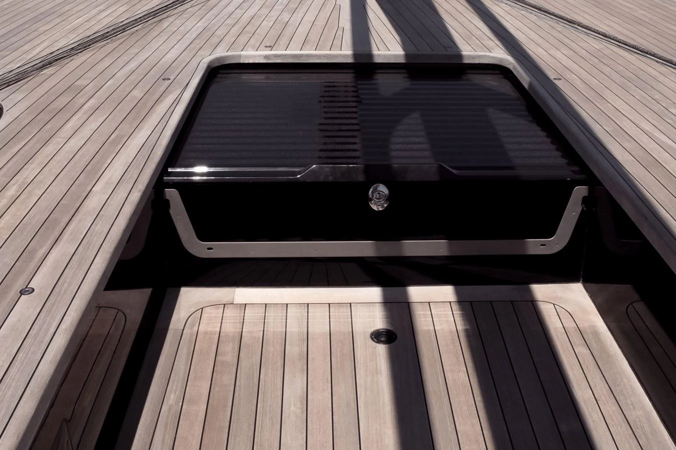 A sleek and modern hatch on the yacht's deck, showcasing fine craftsmanship and attention to detail. aboard BULLITT Yacht for Sale