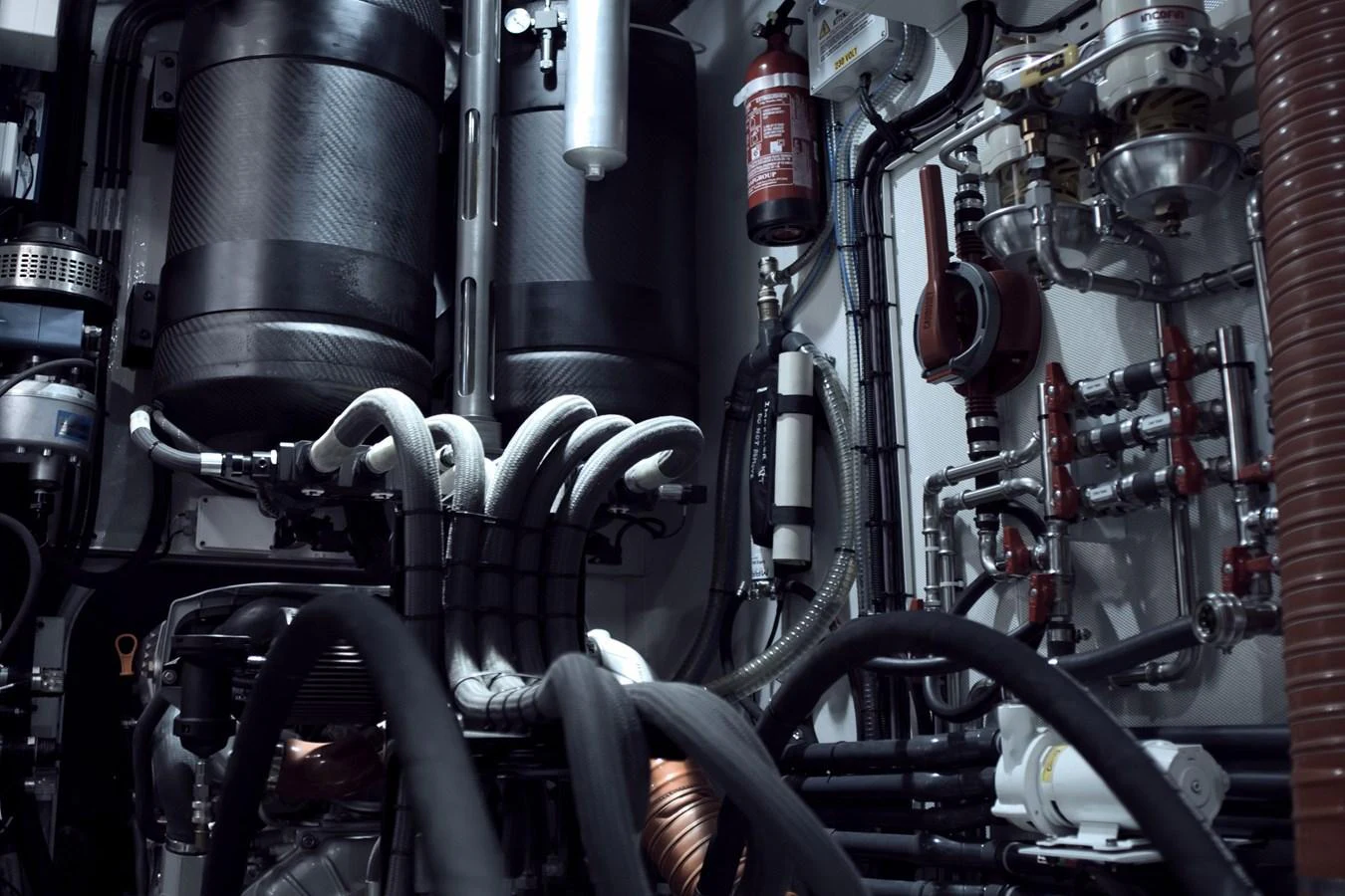 The image showcases the intricate and well-maintained engine room of the yacht. aboard BULLITT Yacht for Sale