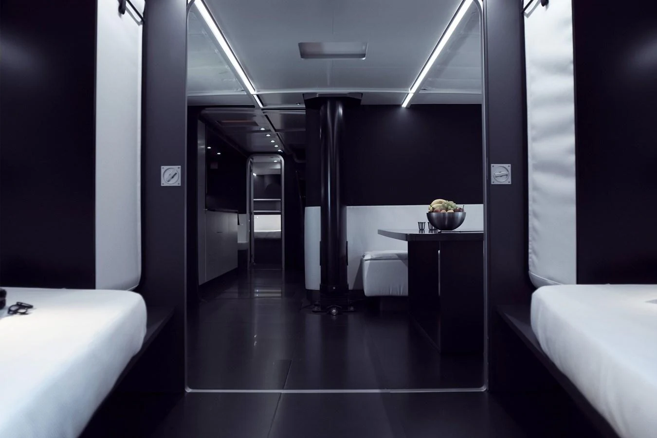 The yacht's interior features a sleek, modern design with minimalist furnishings and a monochromatic color scheme. aboard BULLITT Yacht for Sale