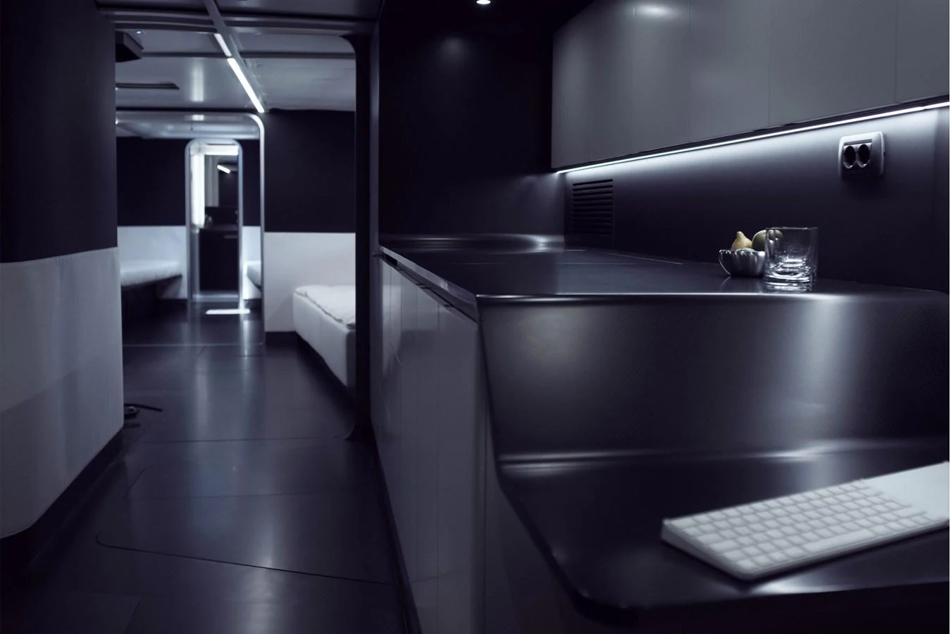 A sleek and modern interior space with minimalist design and ambient lighting. aboard BULLITT Yacht for Sale
