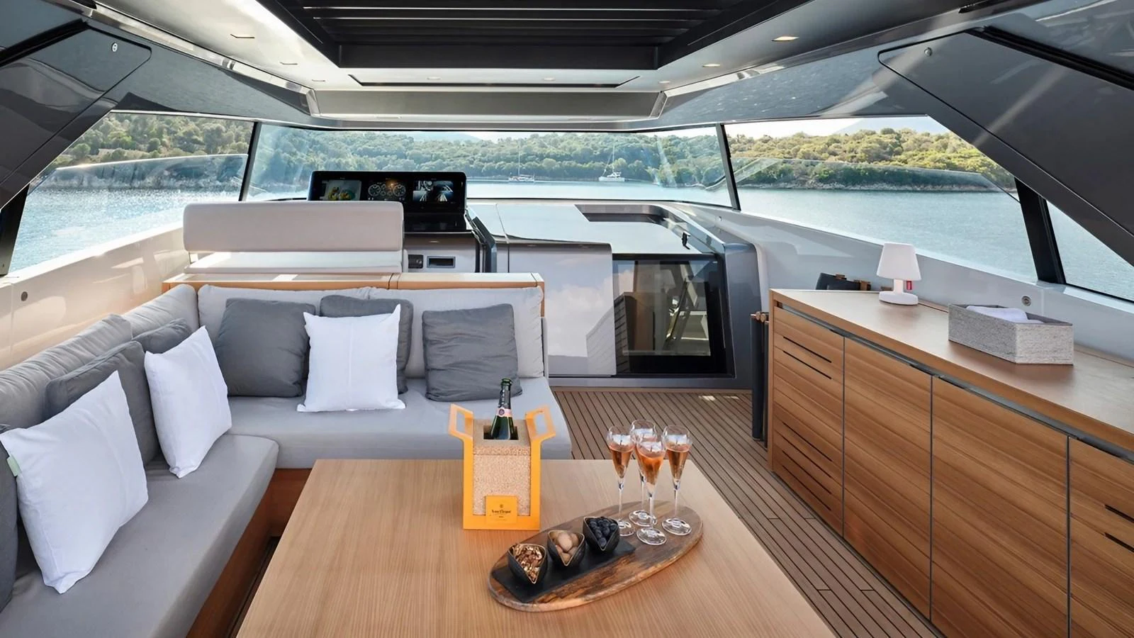 The salon offers a luxurious and spacious area with comfortable seating and panoramic views. aboard SAHASA I Yacht for Sale